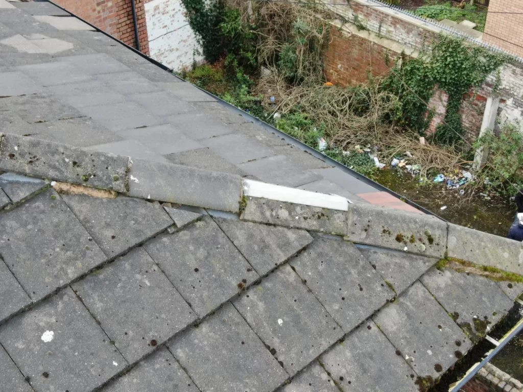 Roof tile inspection with drones.