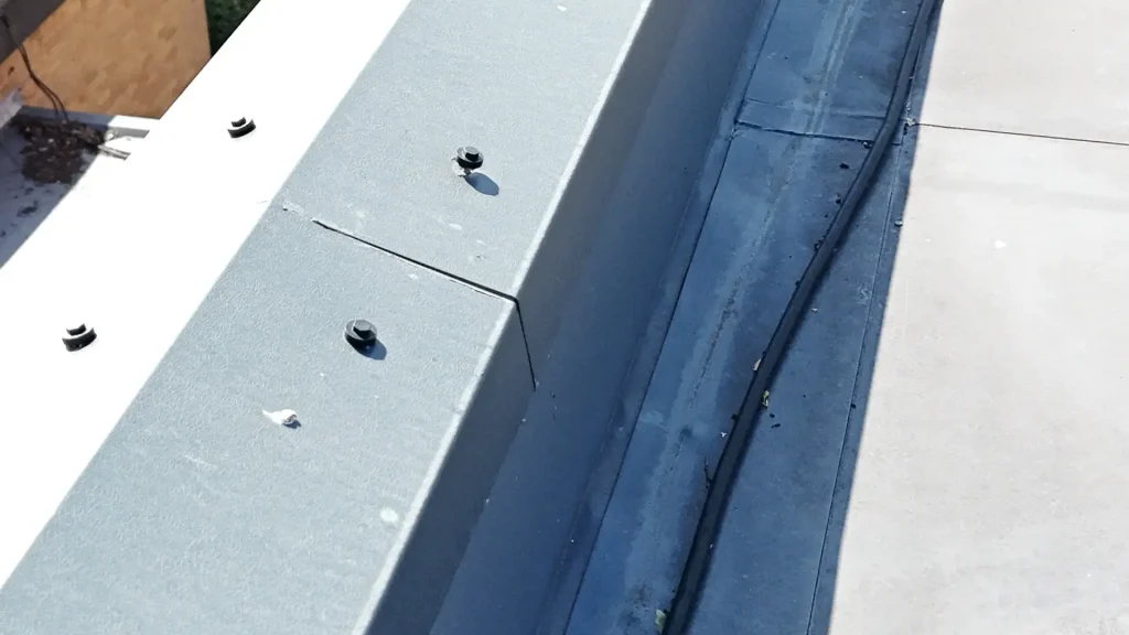 Loose Fixings on Parapet Capping